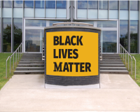 Black Lives Matter sign in front of the Learning Commons. Marywood is Working Together for Racial Justice and Inclusion