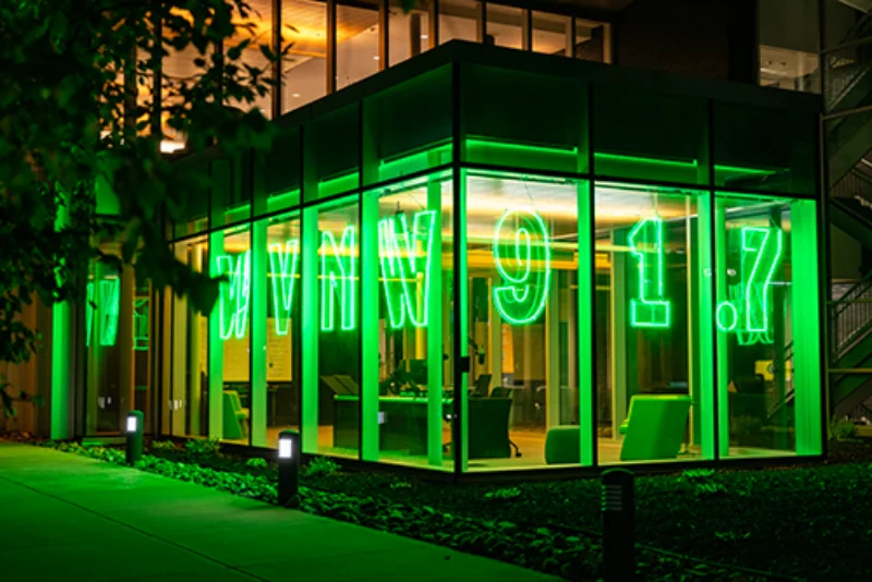 external view of radio station with light up sign