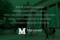 A statement from Marywood in support of Asians and Asian Americans pasted in front of a green backdrop of the University's LAB.