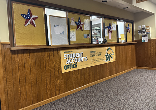 Marywood Student Accounts office with 4 American-flag colored stars and the Pacer logo on a banner