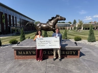Pictured from left are Meghan Carnevale, Director of Corporate & Foundation Relations at Marywood University, and Mark DeStefano, CPA, MSHA, Chief Financial Officer of Pagnotti Enterprises, Inc., during the presentation of an $11,000 Educational Improvement Tax Credit (EITC) donation in support of Marywood University's Momentum Program. Pagnotti Enterprises, Inc. Supports Momentum Program with EITC Donation