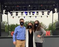 Three Marywood students in front of CNN's Joe Biden Town Hall stage at PNC field Front and Center at Vice President Joe Biden's Town Hall on CNN