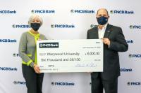 Patricia Rosetti, Marywood University’s leadership annual giving officer; and Jerry Champi, FNCB Bank president and CEO. FNCB Bank Donates $6,000 to Marywood's Momentum Program