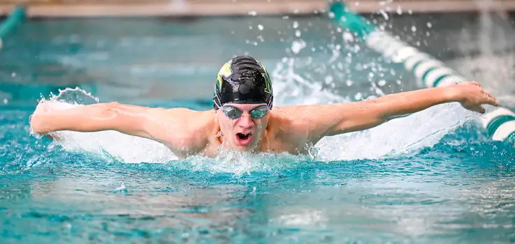 Jason Lee competing in breaststroke