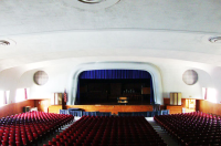 The Sette LaVerghetta Center Theater from the back, highlighting the seating and stage