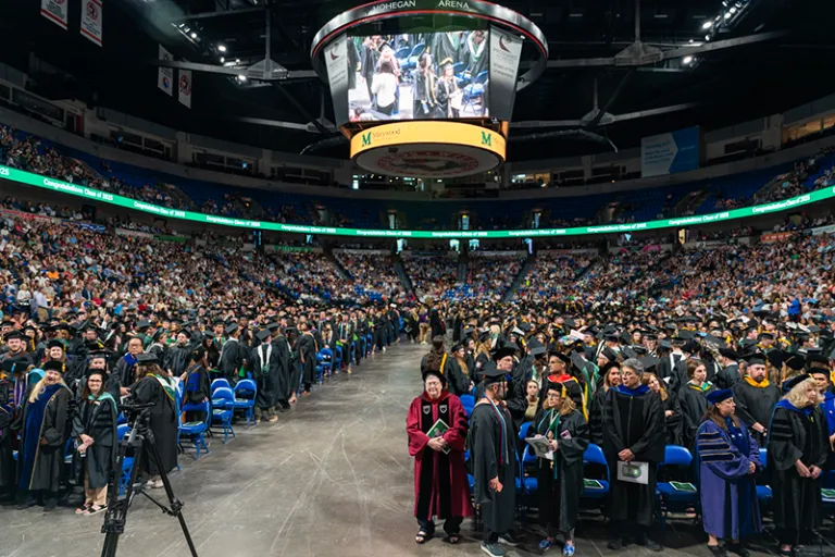 arena full of people in academic attire