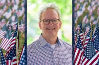 Dr. Jeffrey Rutter, Psychology Professor and U.S. Air Force Veteran, pictured with a background of Flags for the Fallen, is the guest speaker for Marywood's Veterans Ceremony on November 10. Ceremony Set to Commemorate Veterans
