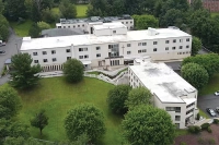 A sky view of the perpandicular white buildings that make up the Marywood heights residence