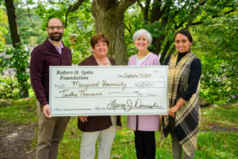 Frank Caputo and Cathy Fitzpatrick, Scranton Area Foundation; Patricia Rosetti, Marywood University, and Jenny Gonzalez, S.T.A.R.S. Program Director, Marywood University