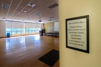 An empty view of the wooden floors in the Latour Conference room