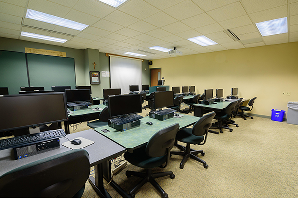 The McGowan computer lab with alternating black and green desks
