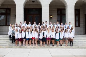 Physician Assistant students accept their first white coat. PA Students Receive White Coats at Ceremony