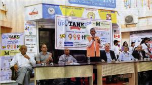 Dr. Christopher Speicher seated to the right of the speaker Dr. Christopher Speicher Serves as Guest Speaker for StartUp Tank in India