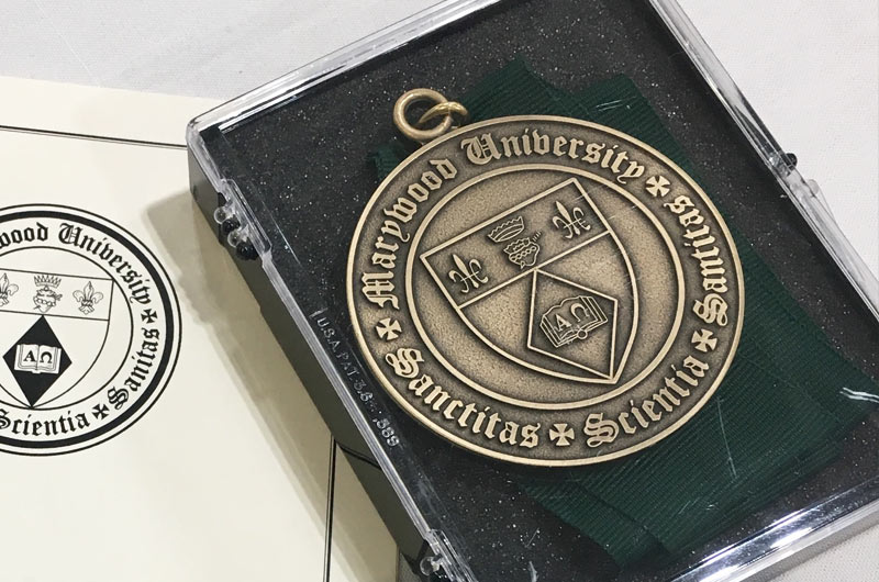 The bestowal of medals for academic excellence and achievement is occuring during various Hooding and Honors ceremonies on campus on Friday, May 19, 2023. 2023 Commencement Medalists