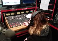 A student disc jockey on VMFM 91.7 91.7 Wins Another Best