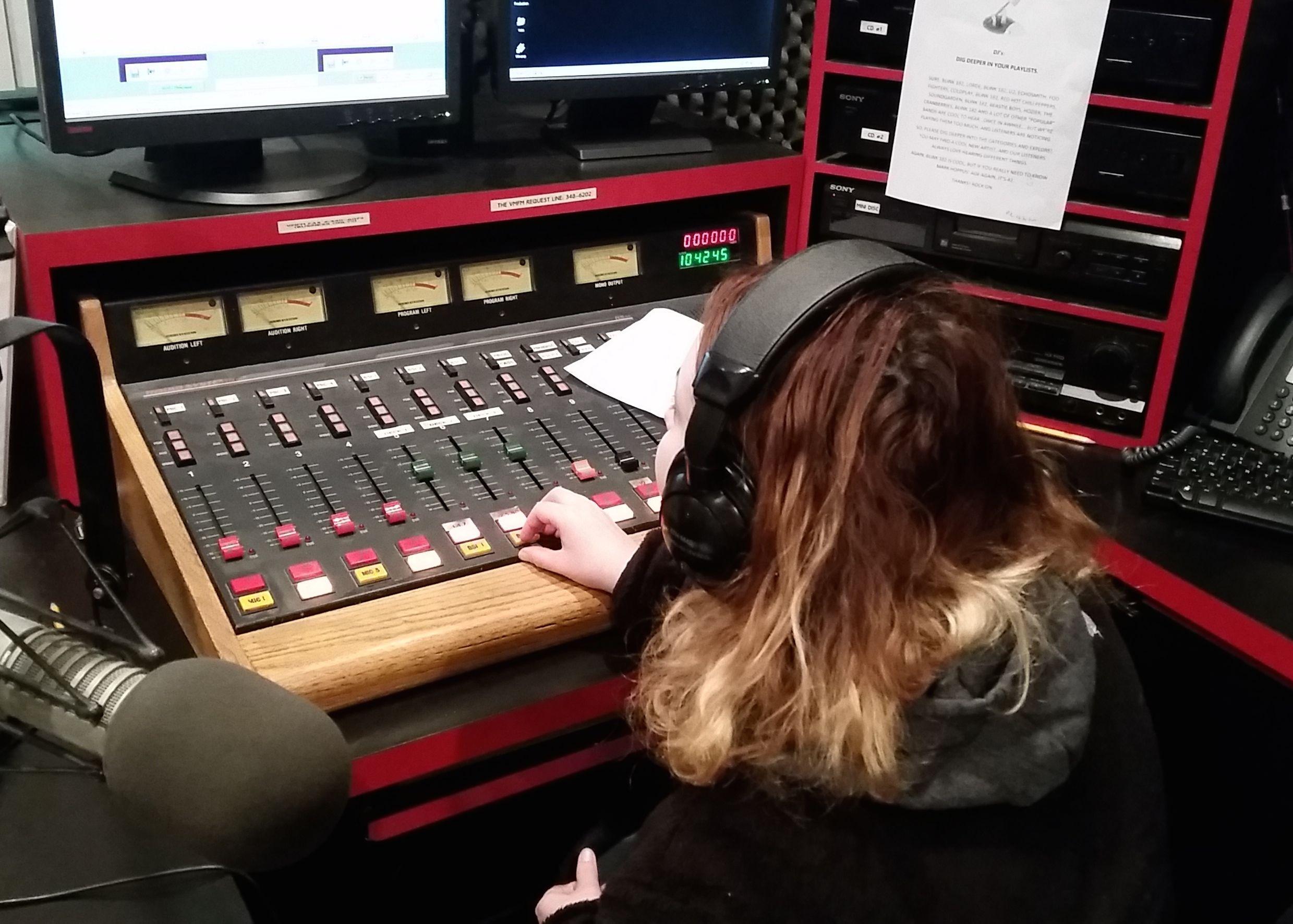 A student disc jockey on VMFM 91.7 91.7 Wins Another Best