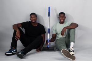 Dimitri Thompson and Kendall Farrell pose with their prototype Entrepreneurs Gear Up for Kickstarter Campaign