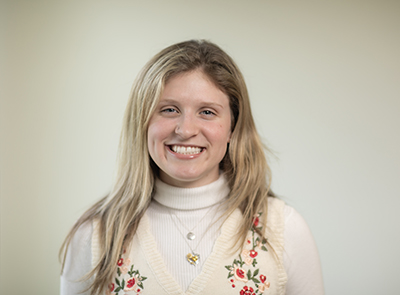 headshot of woman outside