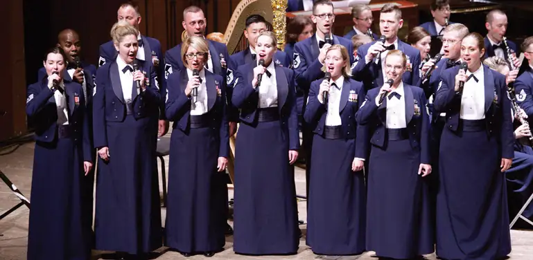 The Singing Sergeants perform on stage at Marywood